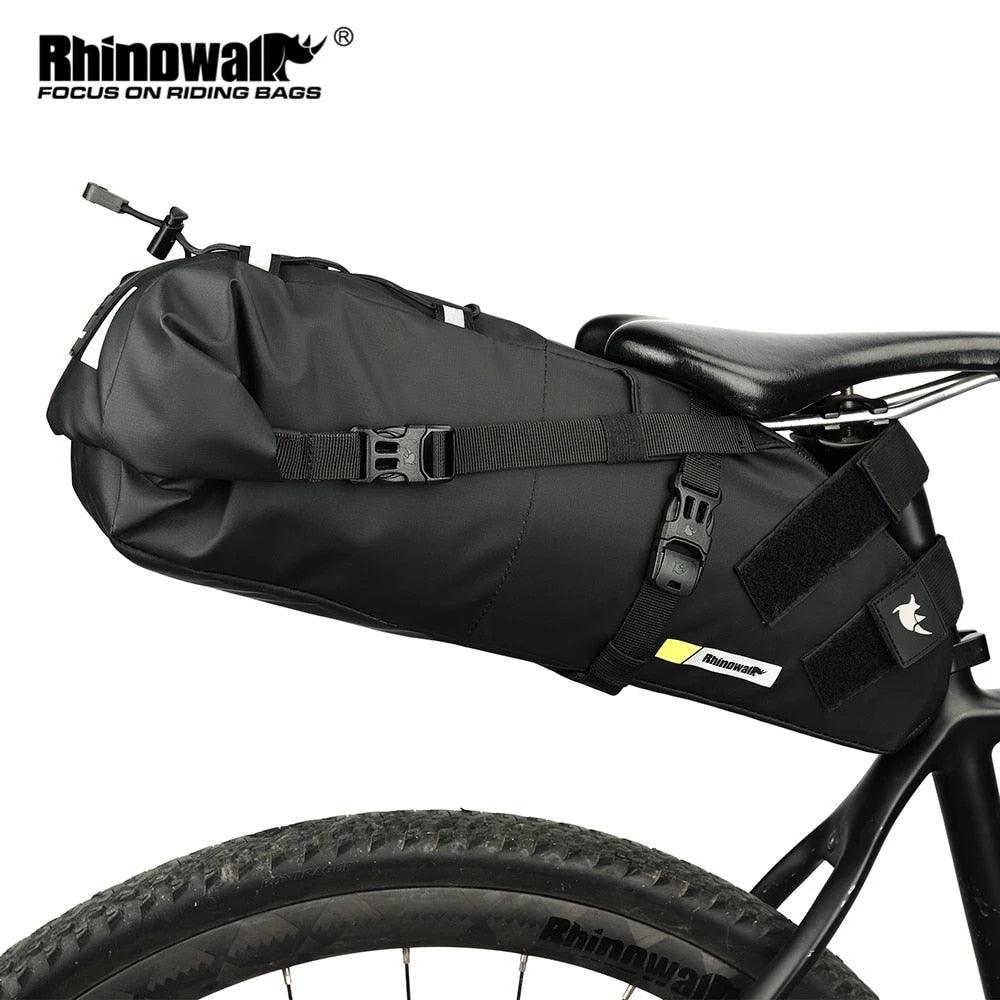 http://pogocycles.com/cdn/shop/products/rhinowalk-bike-bag-waterproof-10l13l-bicycle-saddle-bag-cycling-foldable-tail-rear-bag-mtb-road-trunk-bikepacking-outdoor-travel-pogo-cycles-1.jpg?v=1706004858