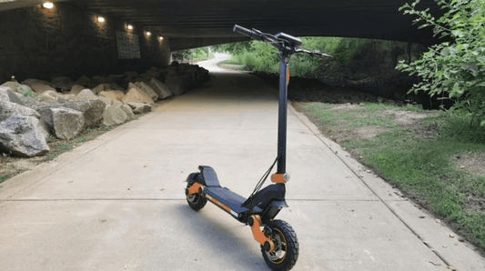 Electric scooter on outdoor path under bridge, Pogo Cycles quality e scooter store